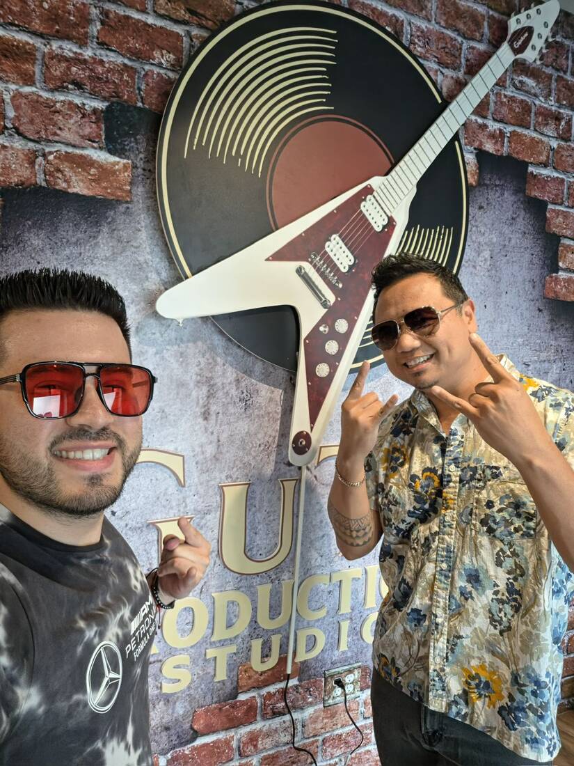 Musicians recording an acoustic session at Gutii Productions